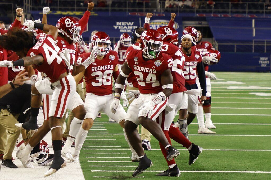 WILL REALIGNMENT CHANGE PLANS FOR PLAYOFF EXPANSION?
